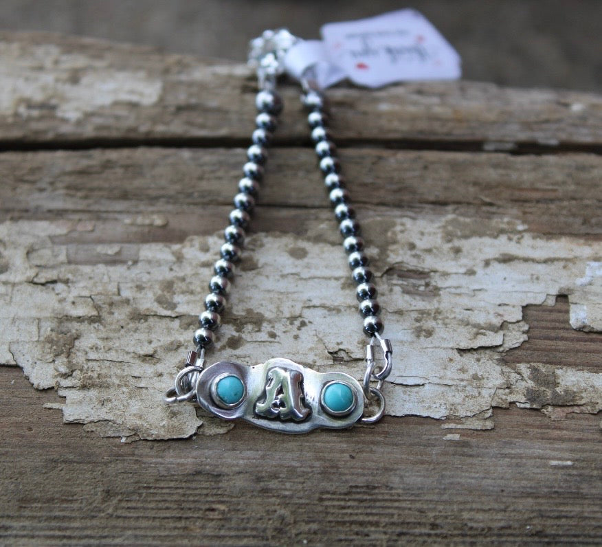 “A” bracelet