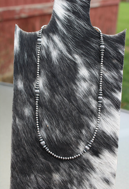 Graduated Saucer Necklace