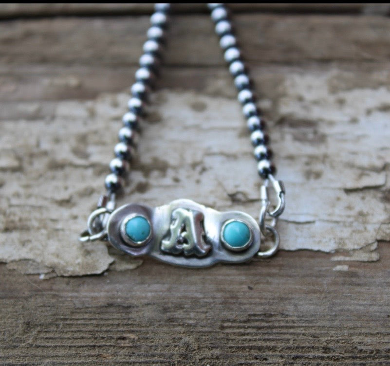 “A” bracelet